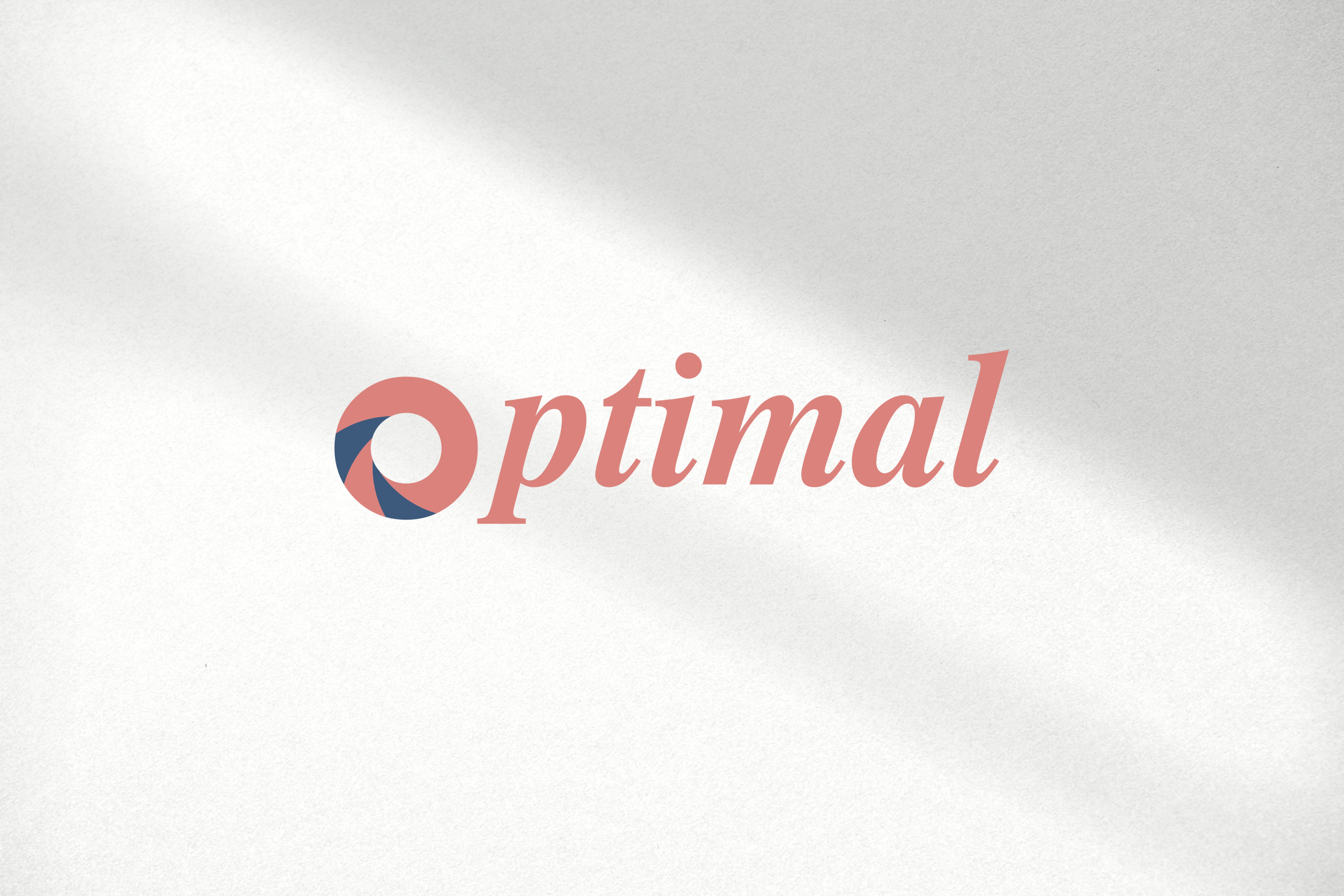 Stylized logo presentation on a textured surface with high-contrast lighting and shadows.