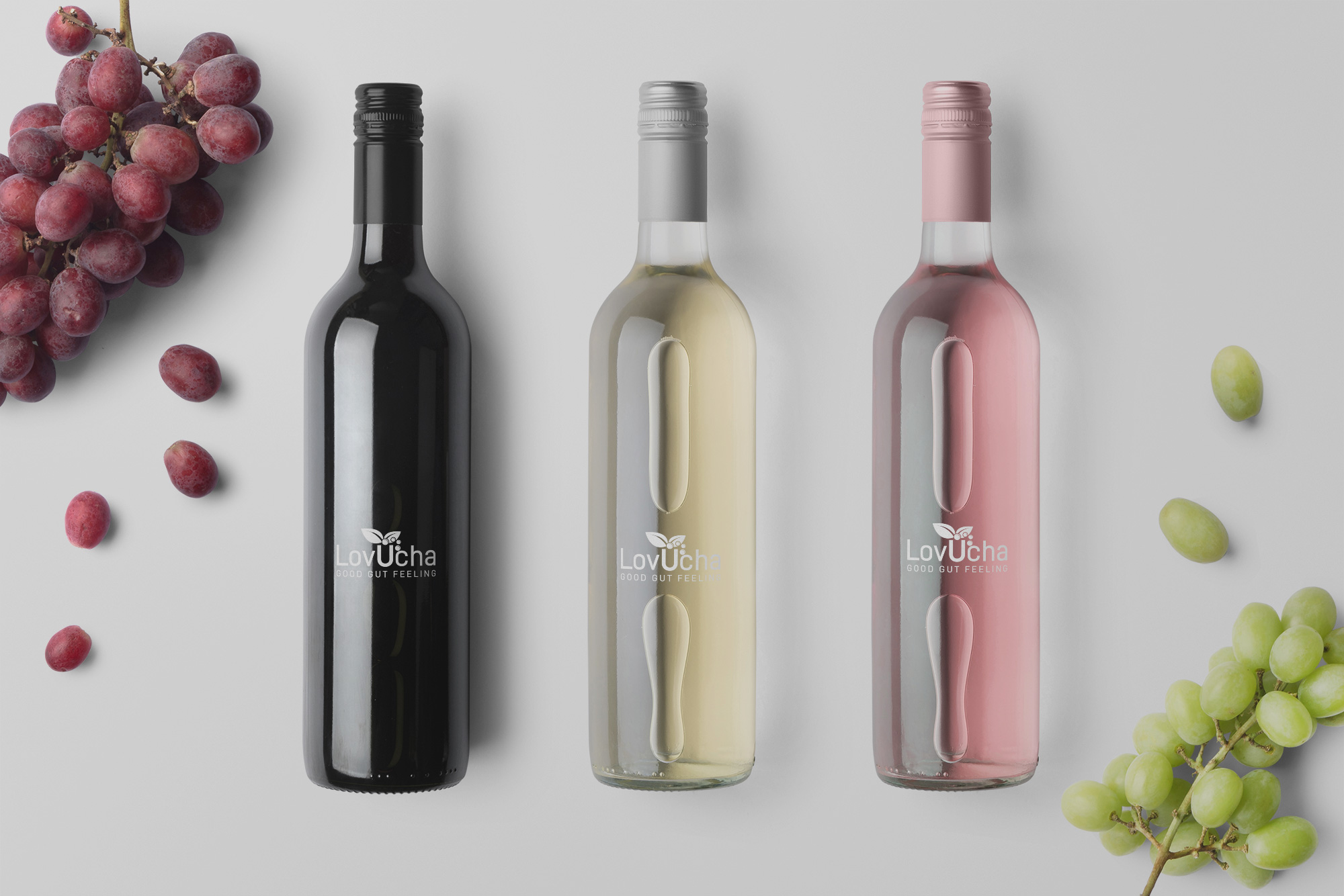 LovUcha logo application on different bottles