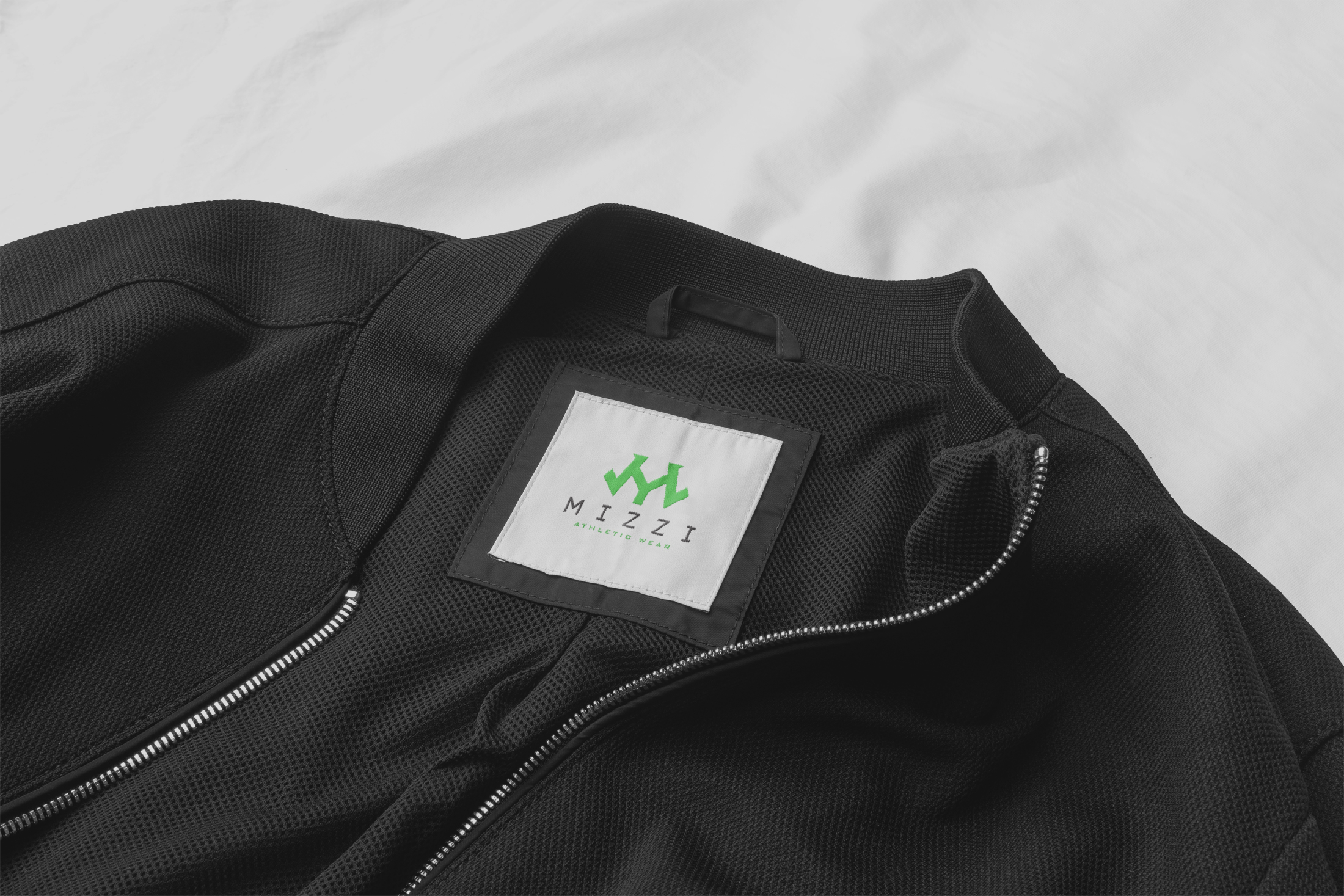 Mizzi logo on jacket tag