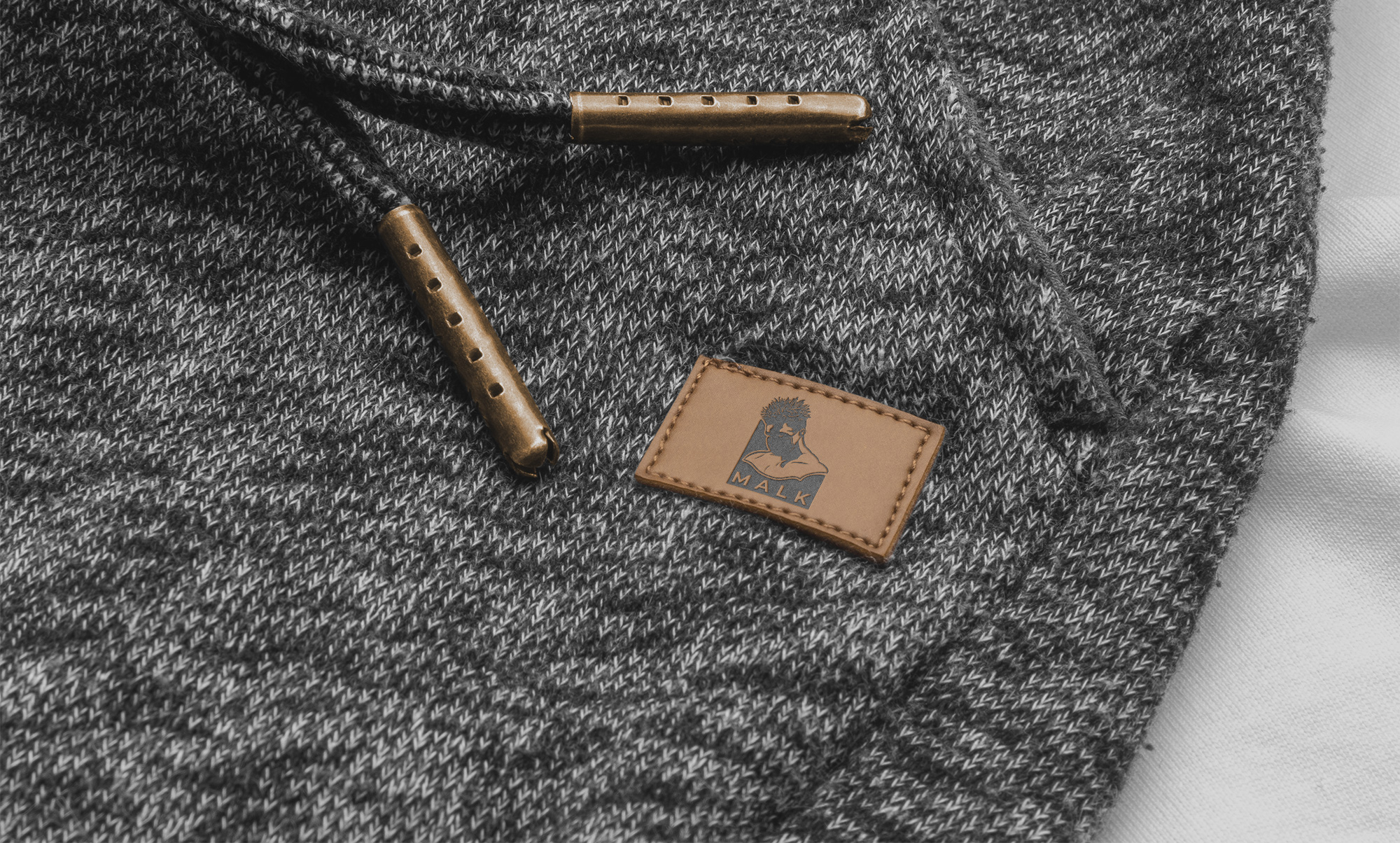 Final logo embossed on a leather tag