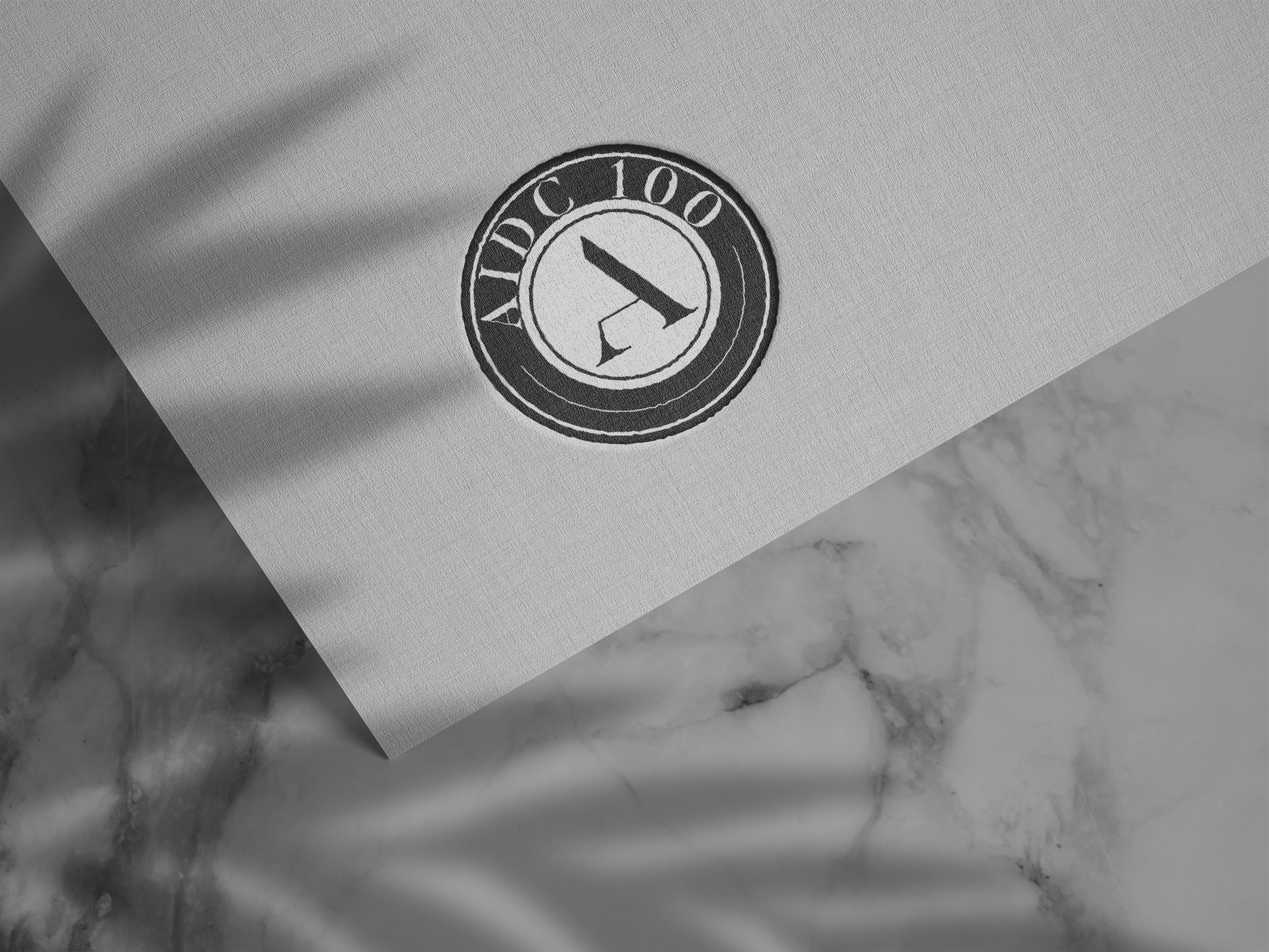 AIDC 100 logo application