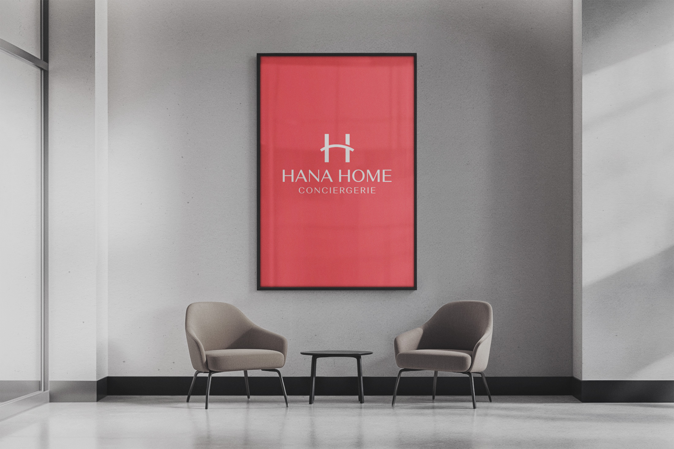 Hana Home Conciergerie logo framed in lobby